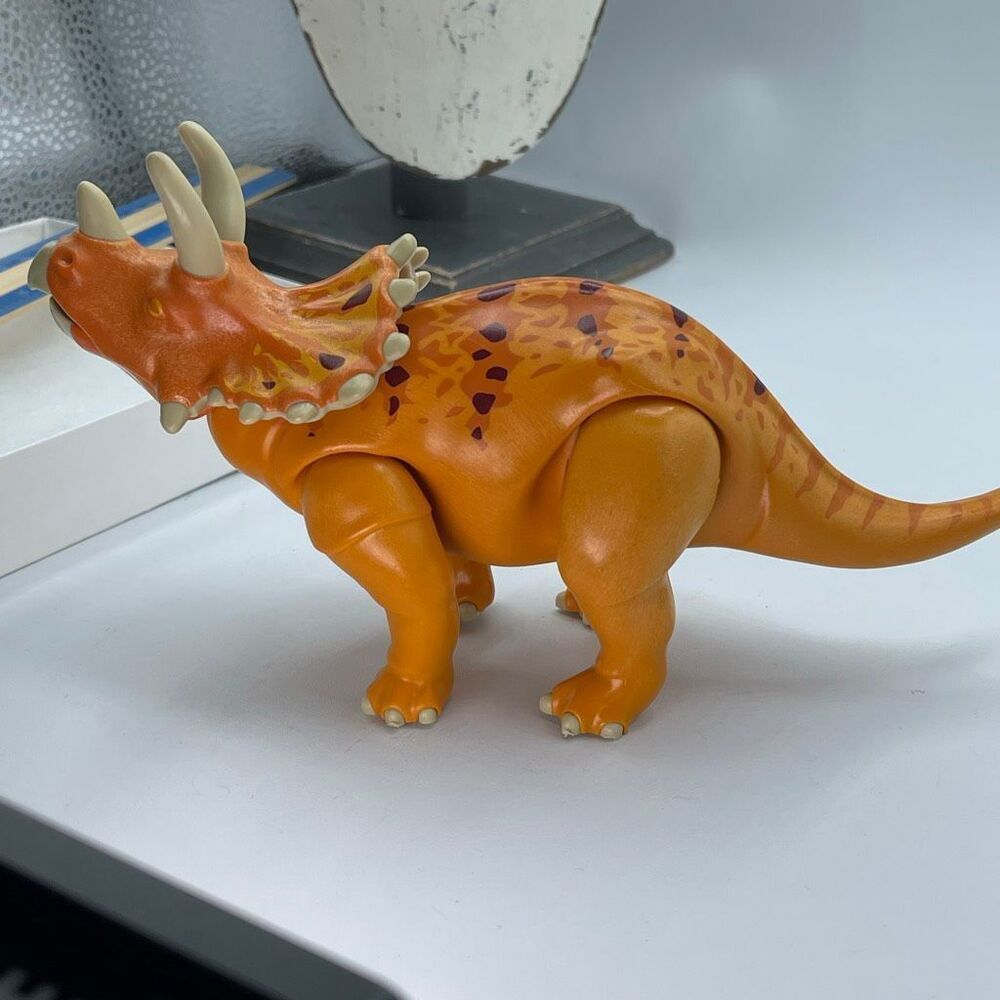 Playmobil orange Triceratops dinosaur figure. Posable.